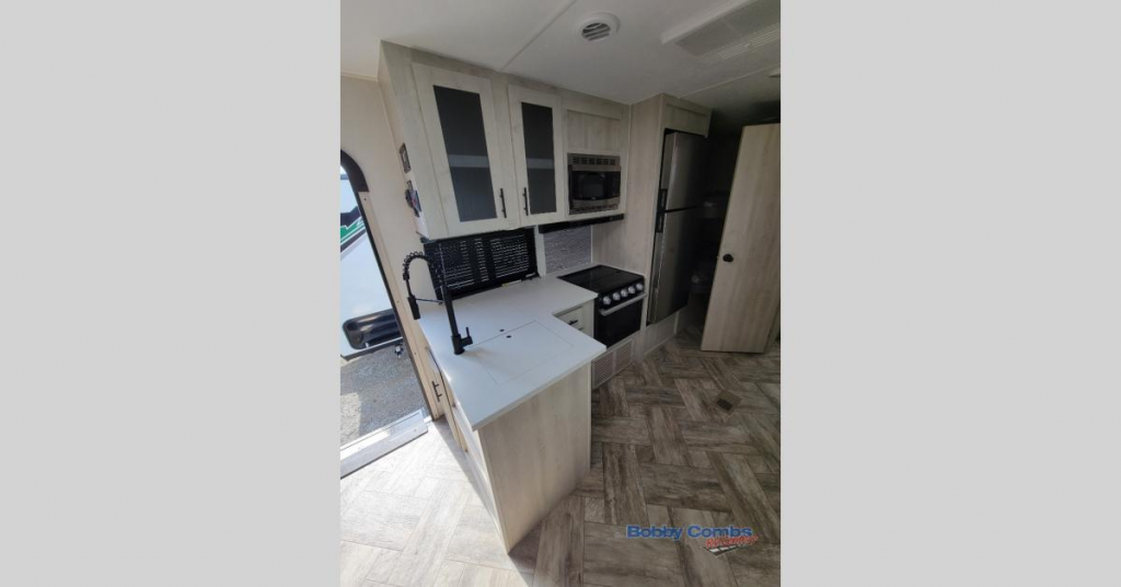 Kitchen in Forest River wild cat travel trailer